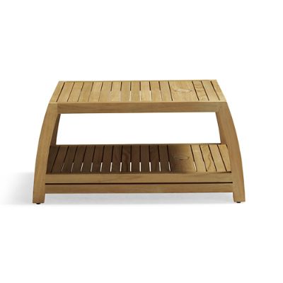 Wooden chaise table with slatted shelf design in natural teak wood.
