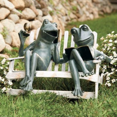 frogs on a bench garden statue