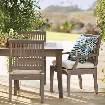 Cassara 7 pc. Rectangular Dining Set in Weathered Teak with Stackable Chairs Umbrella Hole